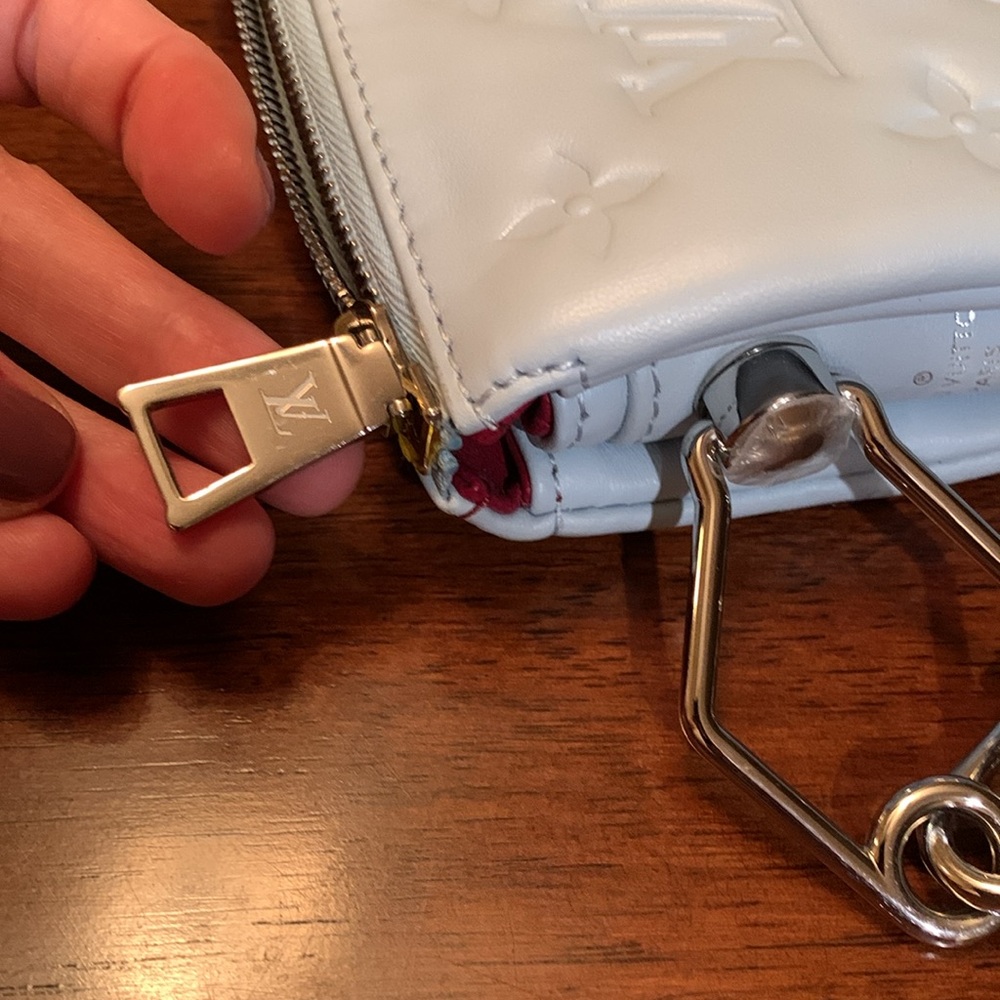 Brand new Louis Vuitton baby blue color Embossed Leather Chain purse. Must have